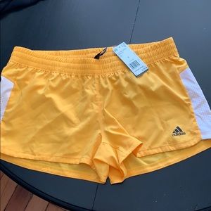 Adidas yellow climalite shorts large